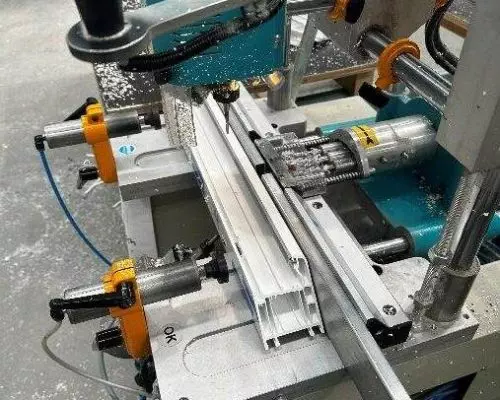 A machine is being used to make a piece of metal.
